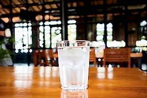 Glass Of Mineral Water On Wood Table In Restaurant 11184296